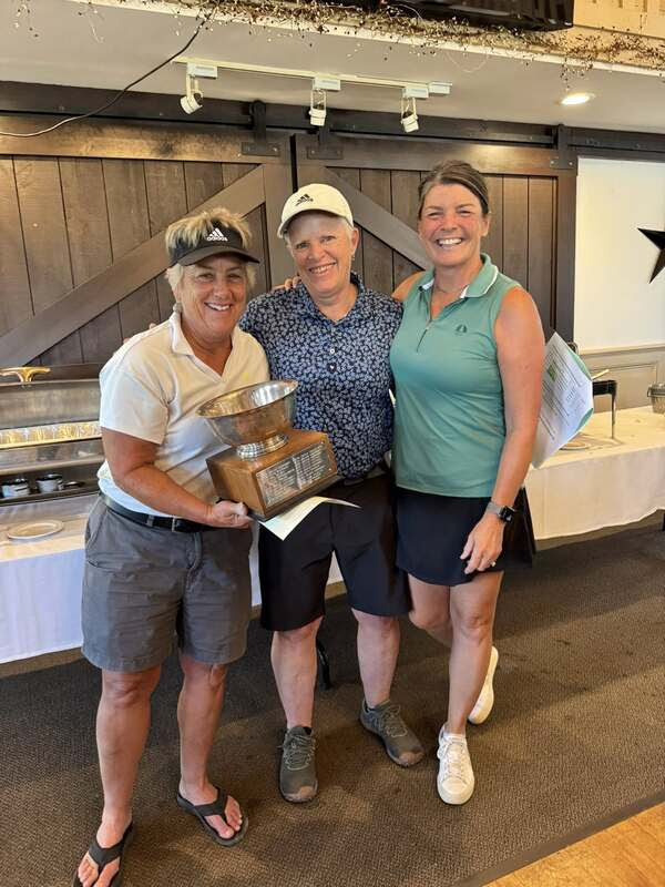 Jeanne Morrissey presented with the Janet Lang Trophy by President Amy Butcher and Operations Administrator Jen Farrington